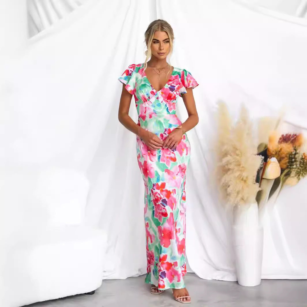 Women's maxi dress with floral design and flowing silhouette Lune London
