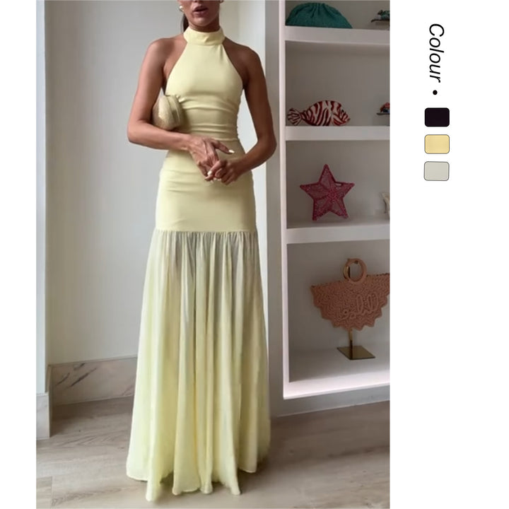 Women's maxi dress with high-neck design and flowing skirt