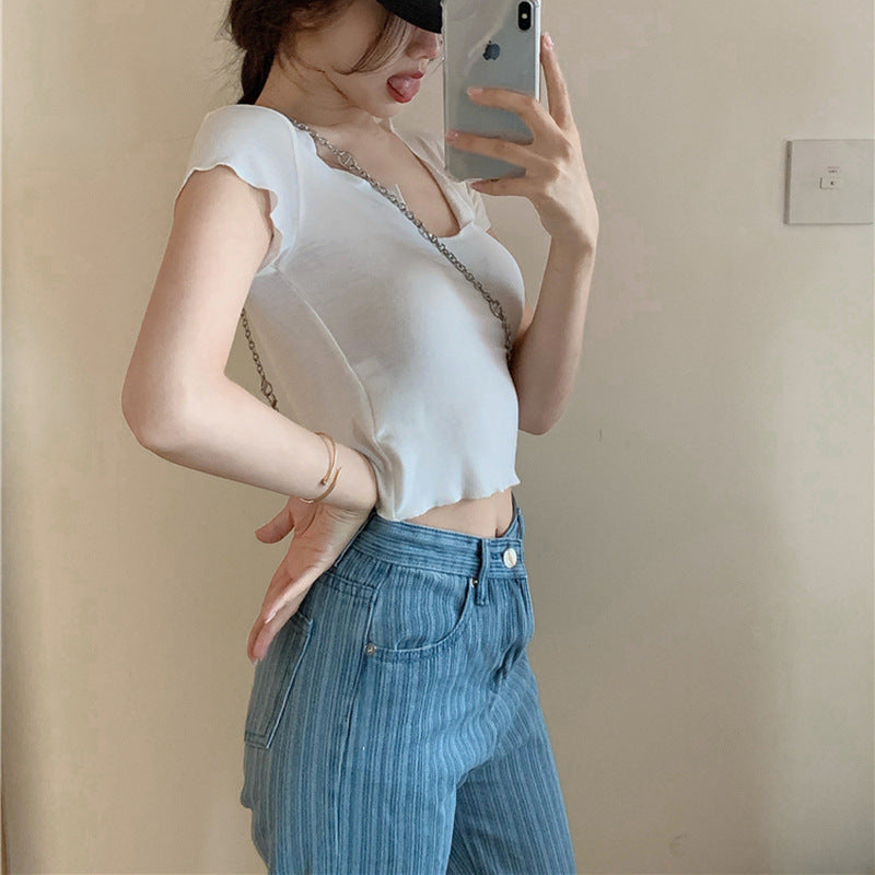 Women's short sleeve top with unique V-neckline and modern design