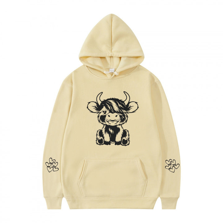 Women's hooded sweatshirt with charming cow motif and practical kangaroo pockets Lisslune