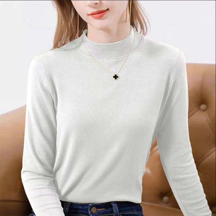 Women's long sleeve ribbed top with elegant stand-up collar and fitted cut