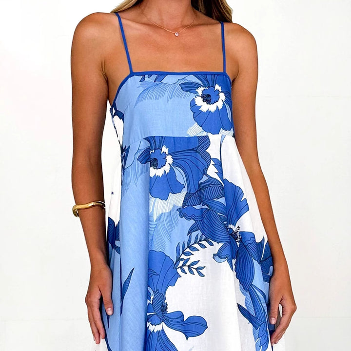 Women's maxi dress with playful floral design and cut-out details