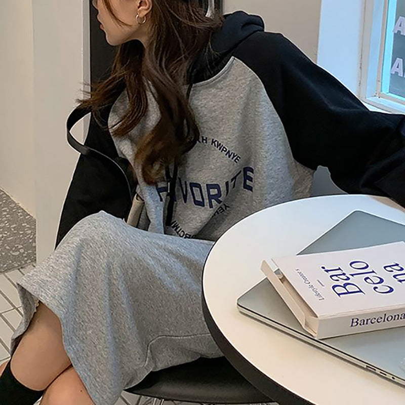 Women’s hoodie dress in casual oversized style with graphic print and side pockets