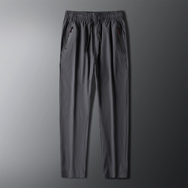 Men's sporty jogging pants with elastic waistband and side zipper Lisslune