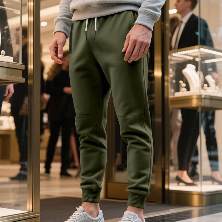 Men's sporty jogging pants with elastic waistband and practical pockets Lisslune