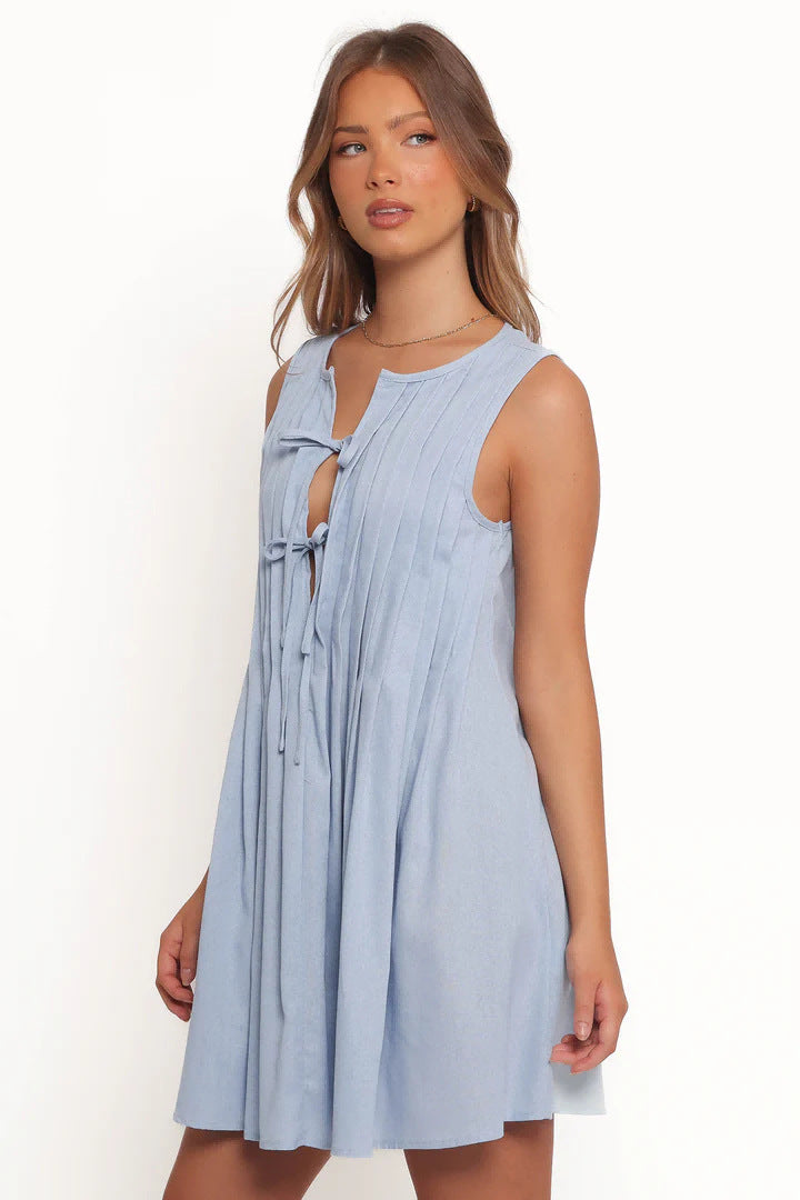 Ladies A-line dress with playful knot and refined pleats Lune London