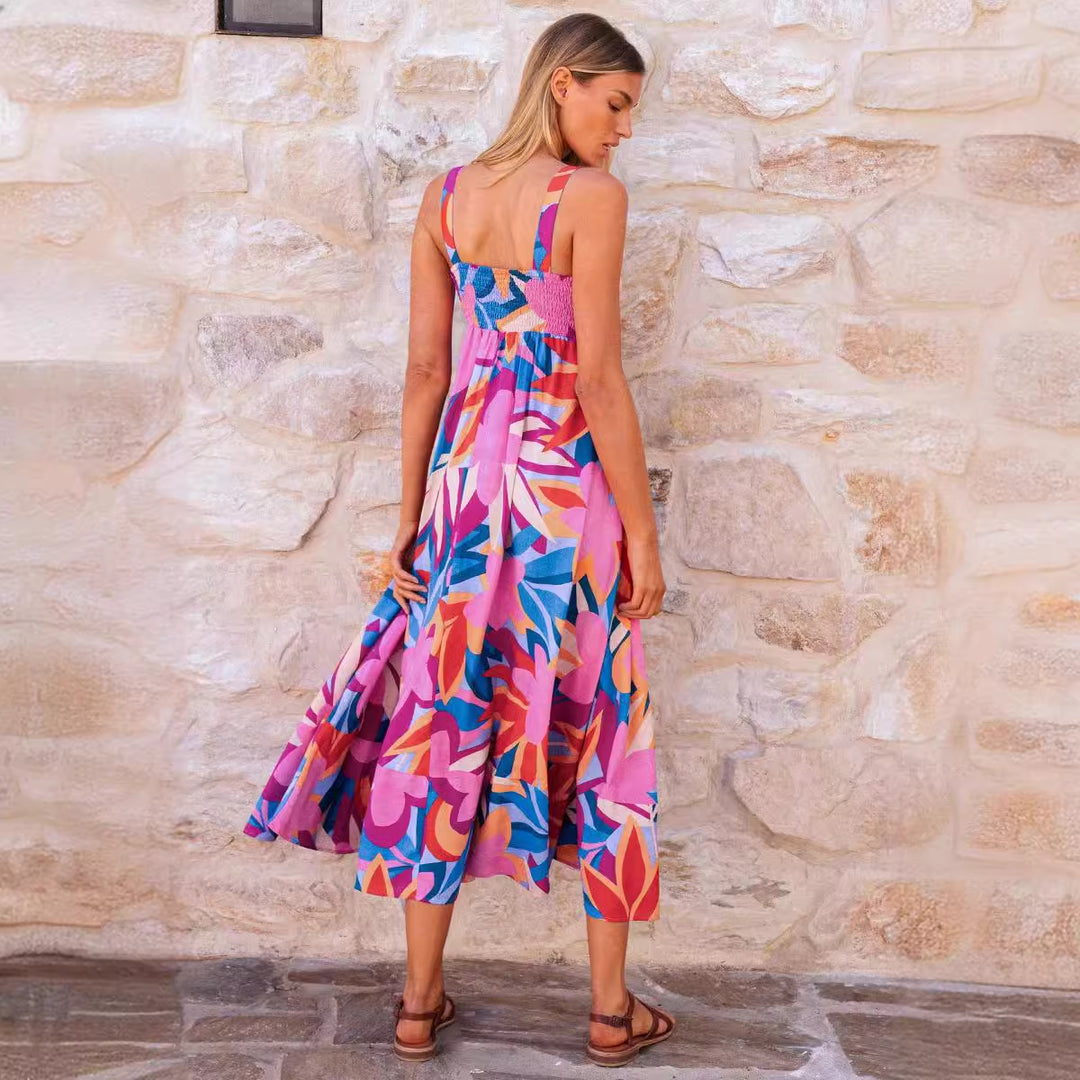 Women's maxi dress with vibrant floral design and flared skirt