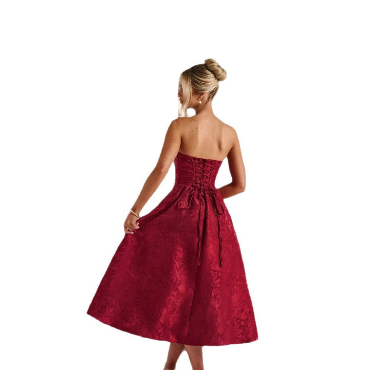Ladies cocktail dress with elegant bustier top and flared skirt