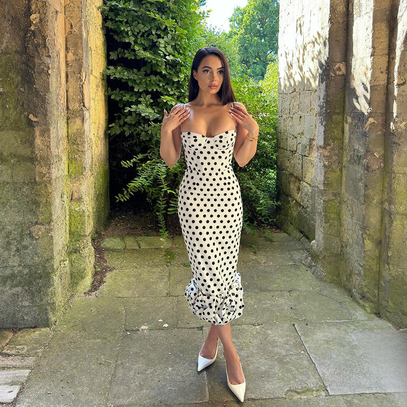 Women’s midi dress with stylish polka dot pattern and voluminous hem Lune London