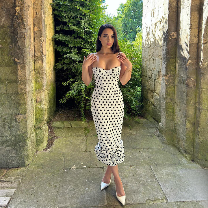 Women’s midi dress with stylish polka dot pattern and voluminous hem Lune London