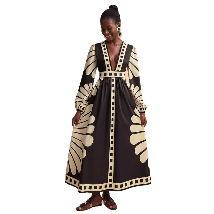 Women's maxi dress with deep V-neck and extravagant sleeve designs Lune London