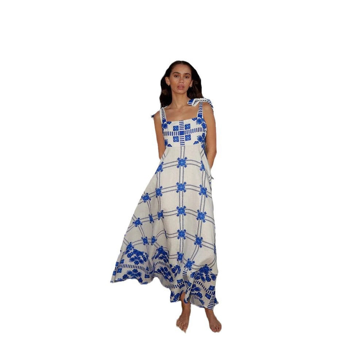 Women's maxi dress with playful check pattern and innovative strap details