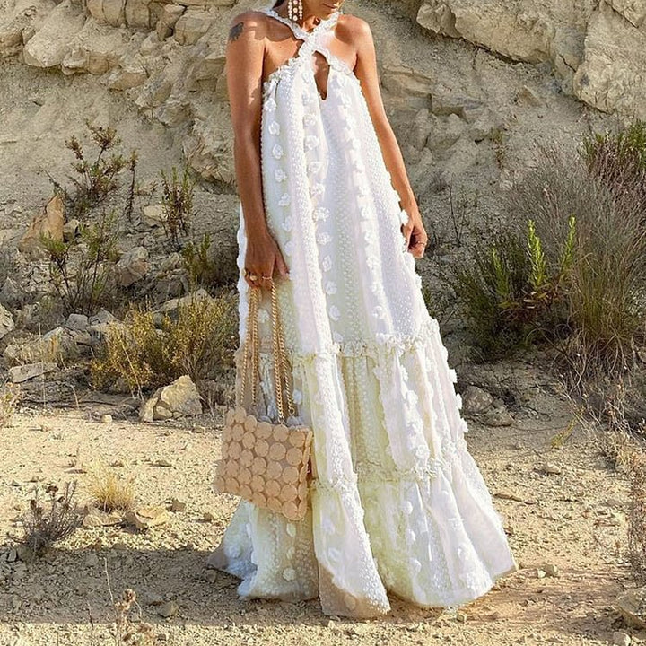 Women's maxi dress with playful ruffle details and floral pattern