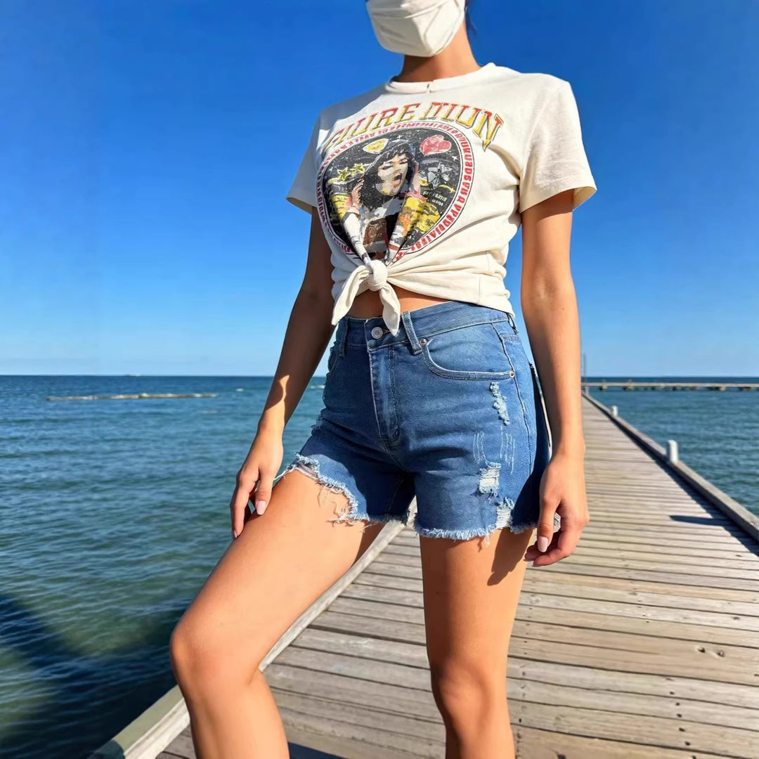 Women's destroyed denim shorts with frayed hem and stylish ripped details Lisslune
