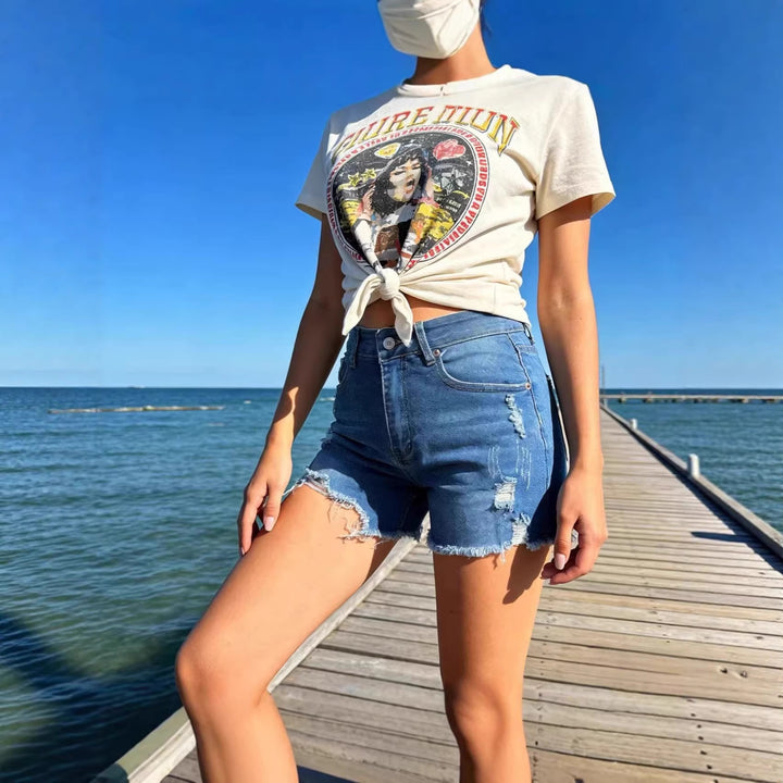 Women's destroyed denim shorts with frayed hem and stylish ripped details Lisslune