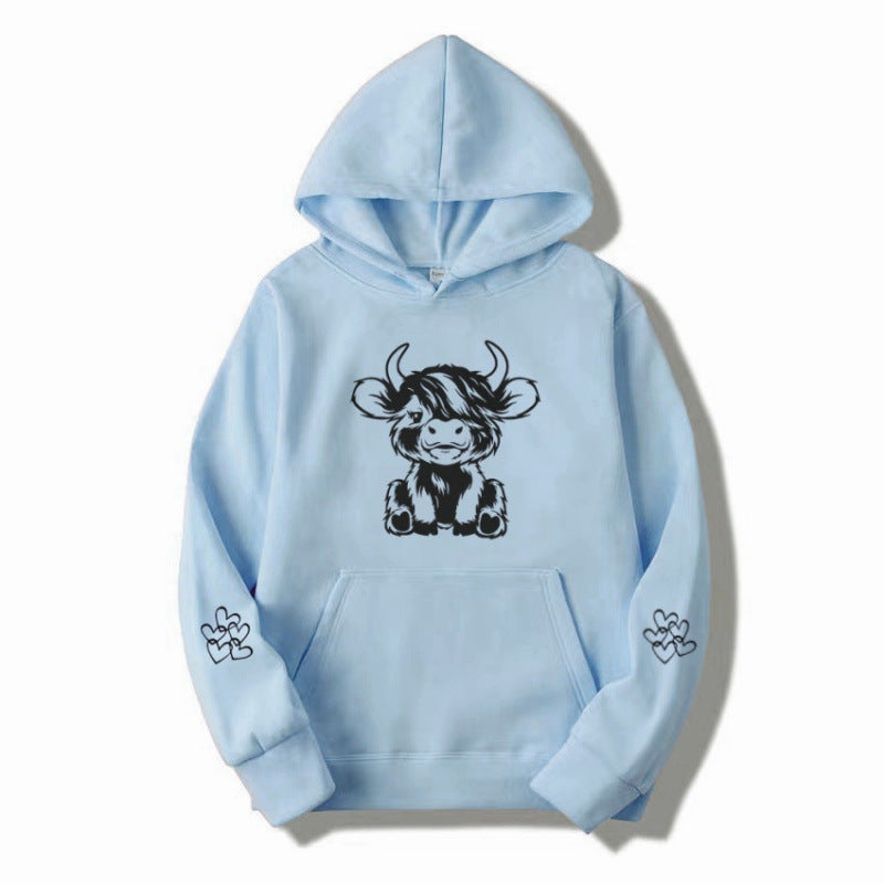 Women's hooded sweatshirt with charming cow motif and practical kangaroo pockets Lisslune