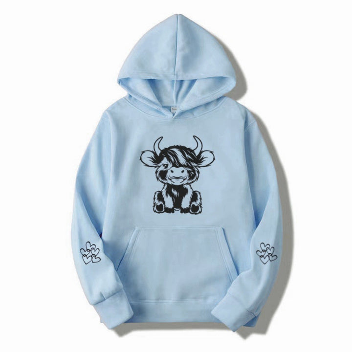 Women's hooded sweatshirt with charming cow motif and practical kangaroo pockets Lisslune