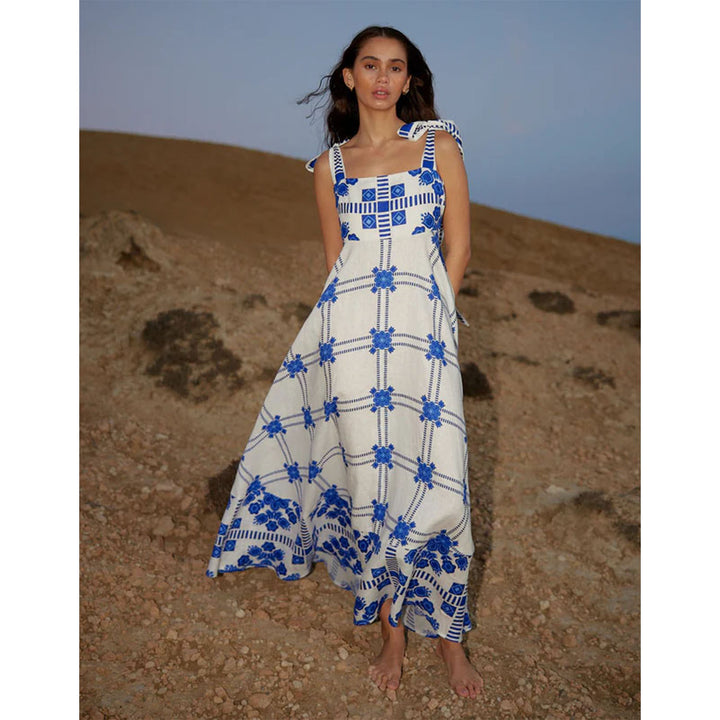Women's maxi dress with playful check pattern and innovative strap details