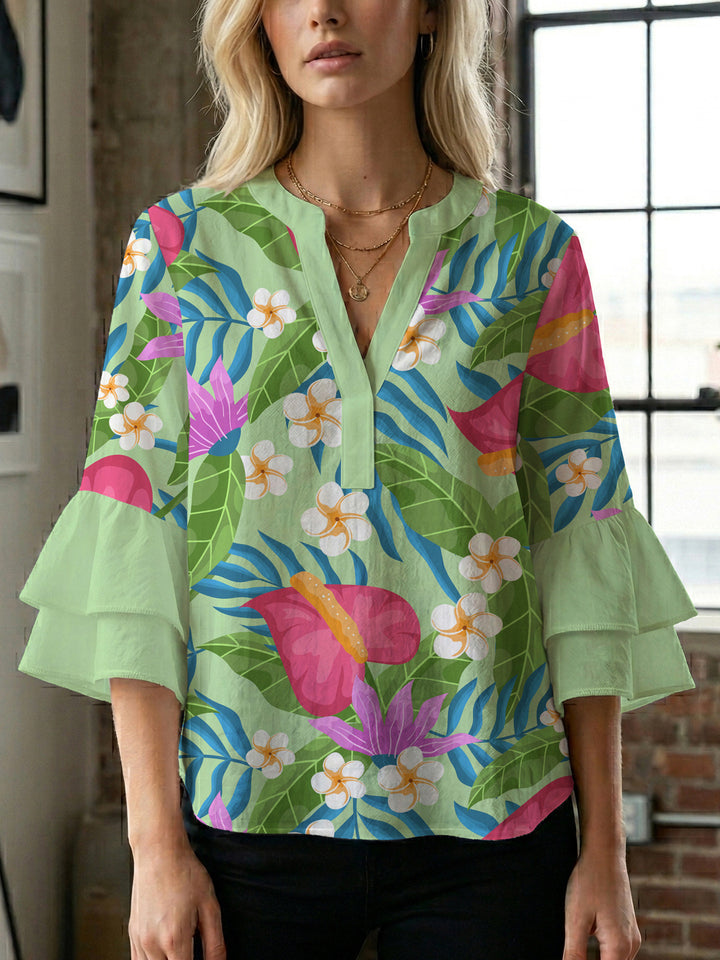 Women’s blouse with voluminous ruffled sleeves and floral pattern Lisslune