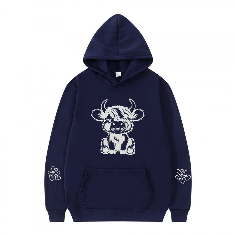 Women's hooded sweatshirt with charming cow motif and practical kangaroo pockets Lisslune