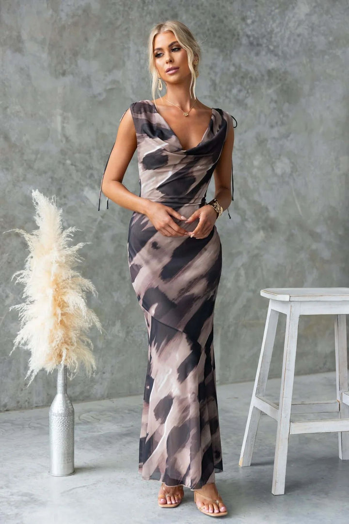 Women's maxi dress with elegant water neckline and floral accents
