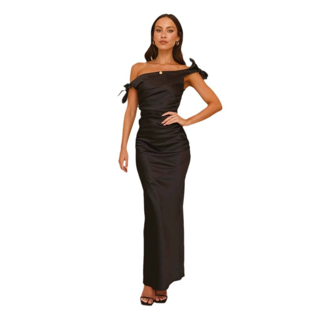 Women’s evening dress with off-the-shoulder design and ruffle detail