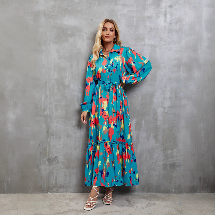 Women's maxi dress with colorful floral design and elegant waist belt