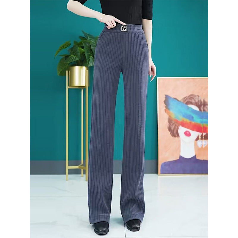 Women's high-waisted flared trousers with stylish ribbed design and elastic waistband