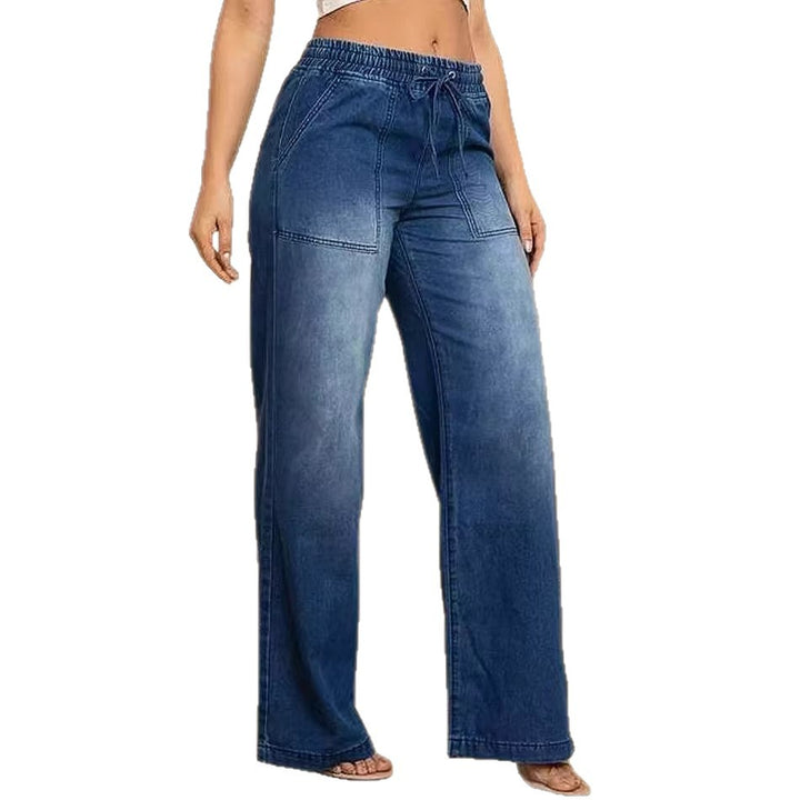 Women's wide-cut jeans with elastic waistband and trendy used look