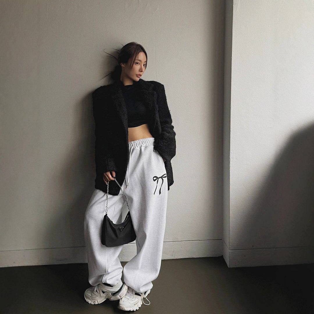 Women's loose leisure pants with elastic waistband and decorative bow motif Lisslune