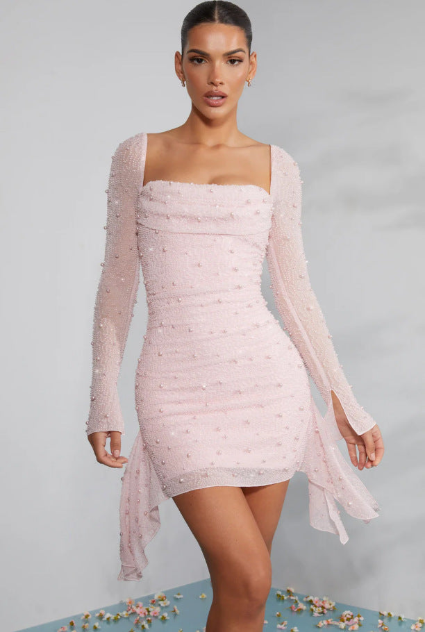 Ladies functional dress with sophisticated draping and delicate pearl embellishment