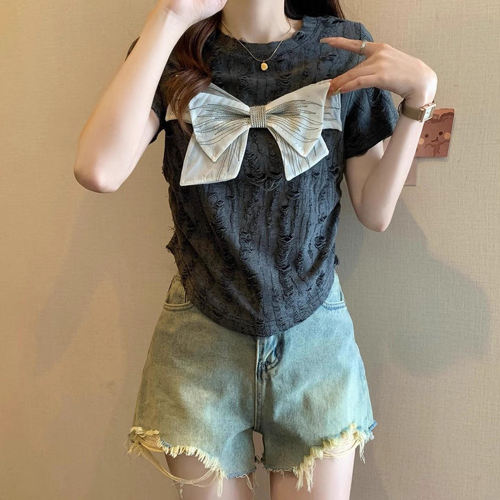Women's short sleeve shirt with decorative bow detail