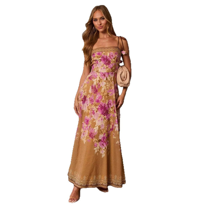 Women's maxi dress in romantic Bohemian style with floral accents and adjustable straps
