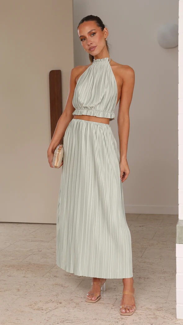Women's maxi dress with expressive pleated skirt and stylish halter neck Lune London