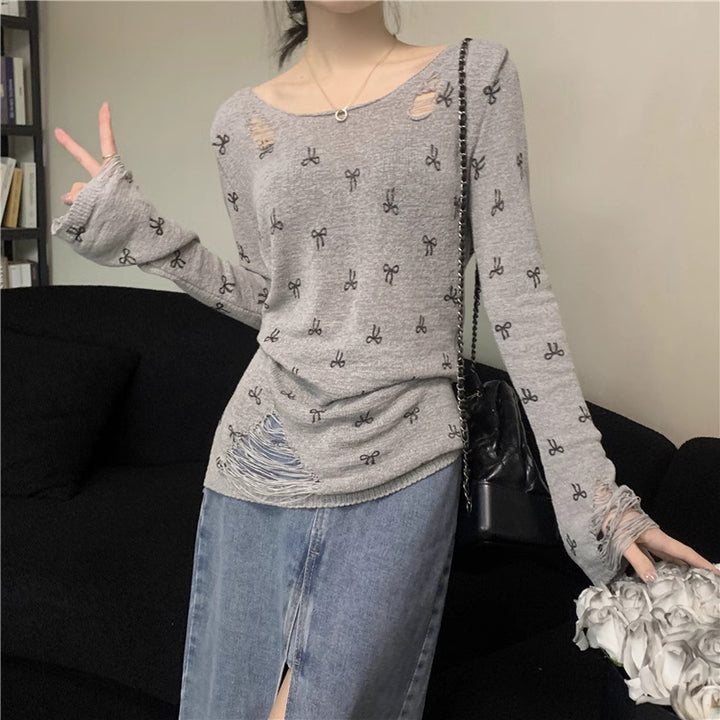 Women's long sleeve shirt with stylish rips and playful motif Lisslune