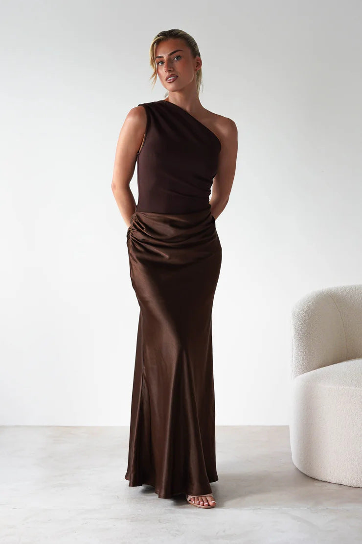 Women’s evening dress with asymmetrical cut and elegant draping design