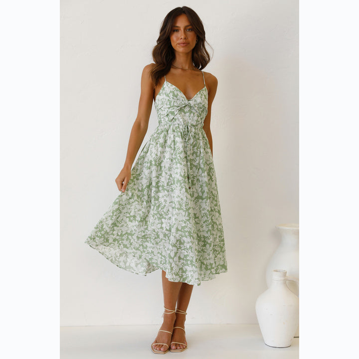 Women's midi dress with elegant wrap design and floral pattern mix Lune London