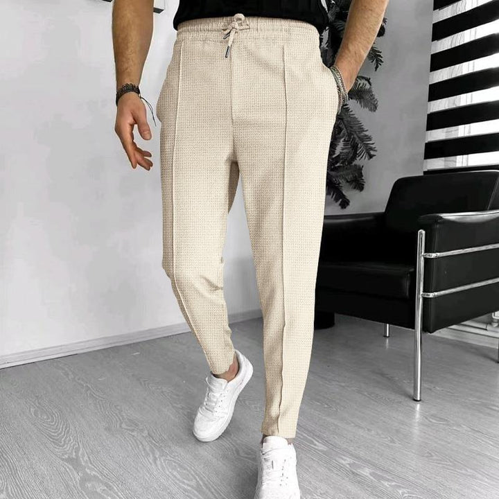 Men's loose casual pants with elastic waistband and stylish textured design Lisslune