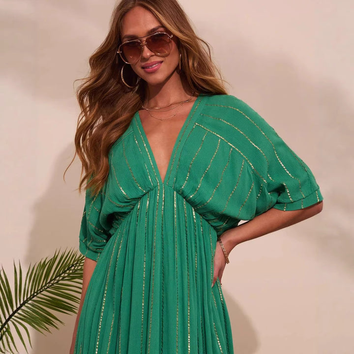 Women's maxi dress with high V-neck and flowing pleats