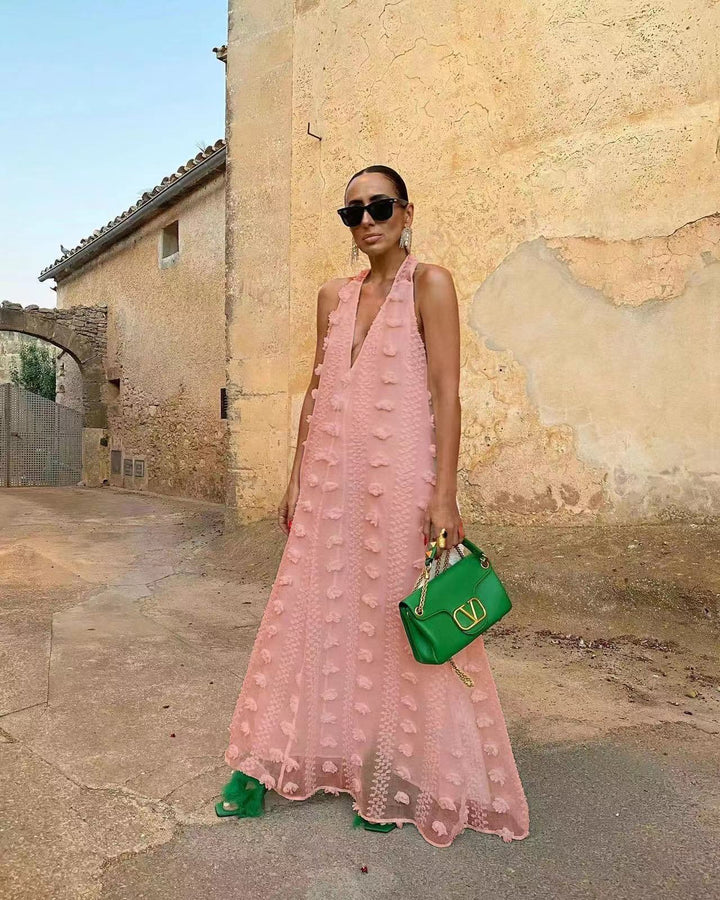 Women's maxi dress with volumetric texture details and deep V-neck