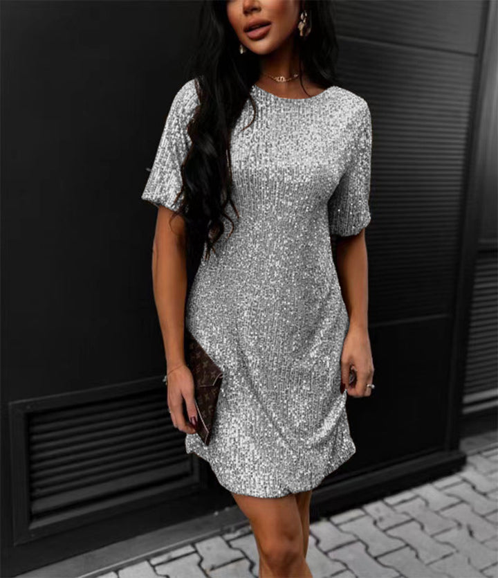 Women's festive cocktail dress made of sparkling material with a light A-line cut