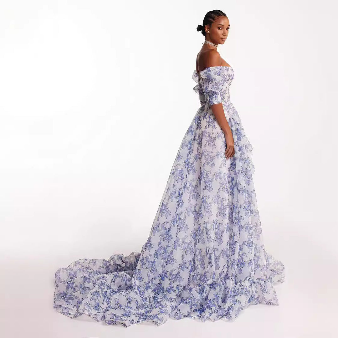 Women's festive maxi dress with off-shoulder design and floral ruffle details