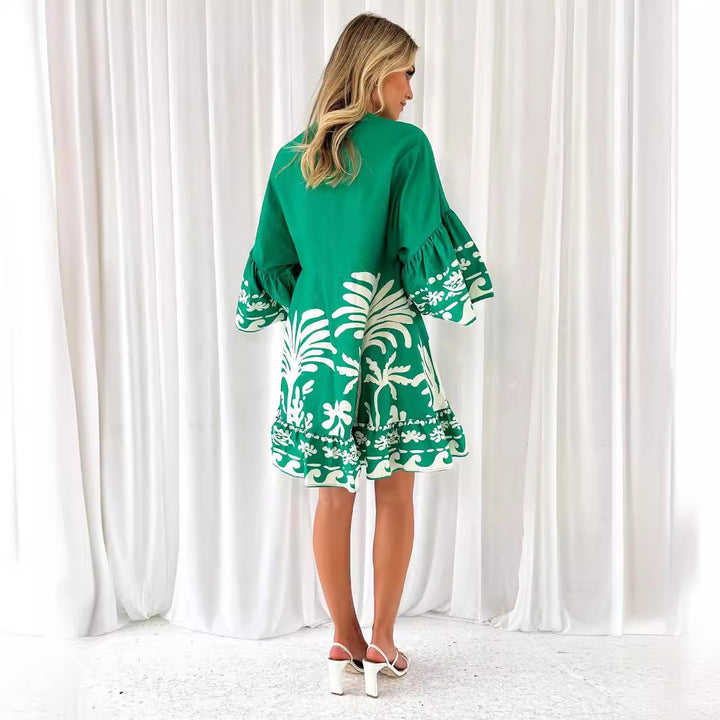 Women's casual dress with voluminous sleeves and structured ruffle details