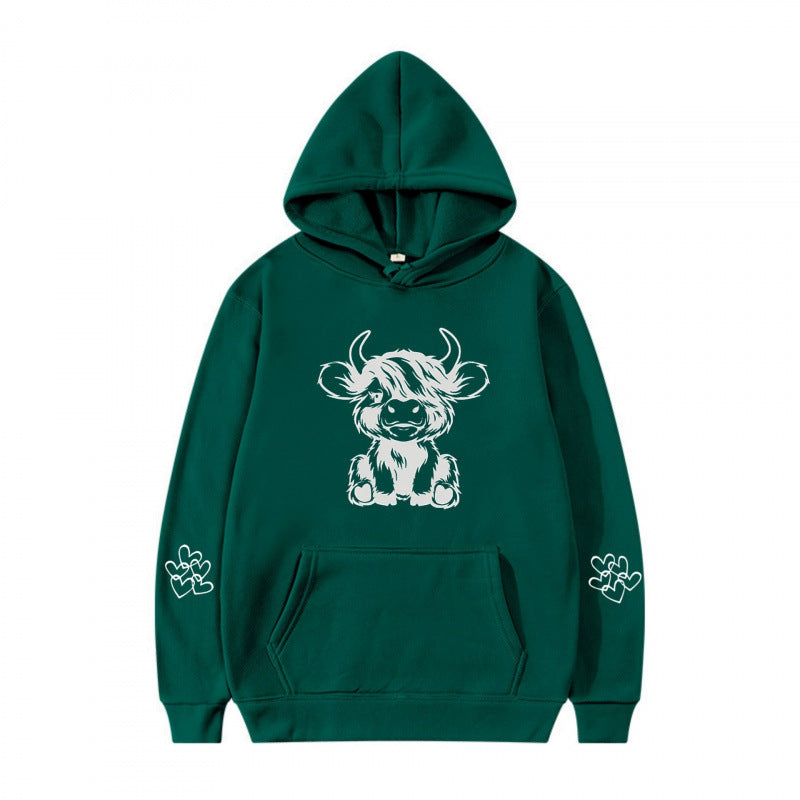 Women's hooded sweatshirt with charming cow motif and practical kangaroo pockets Lisslune