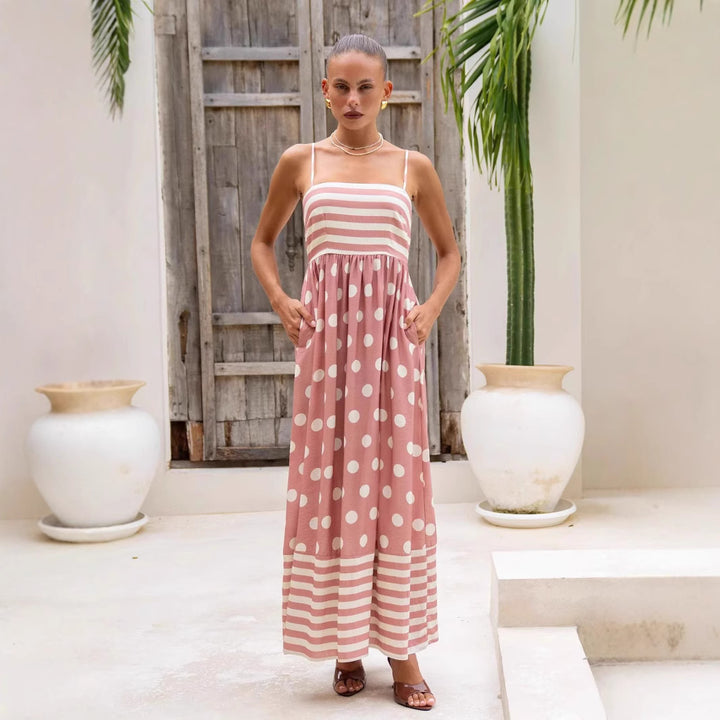 Women's maxi dress with gathered bodice and playful polka dot and stripe pattern Lune London