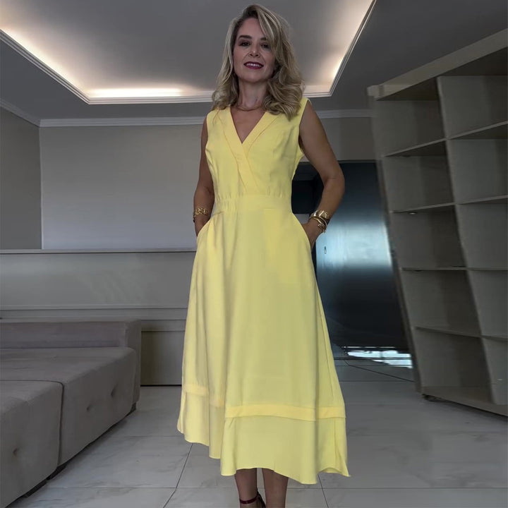 Women's midi dress with a flattering cut and practical pockets