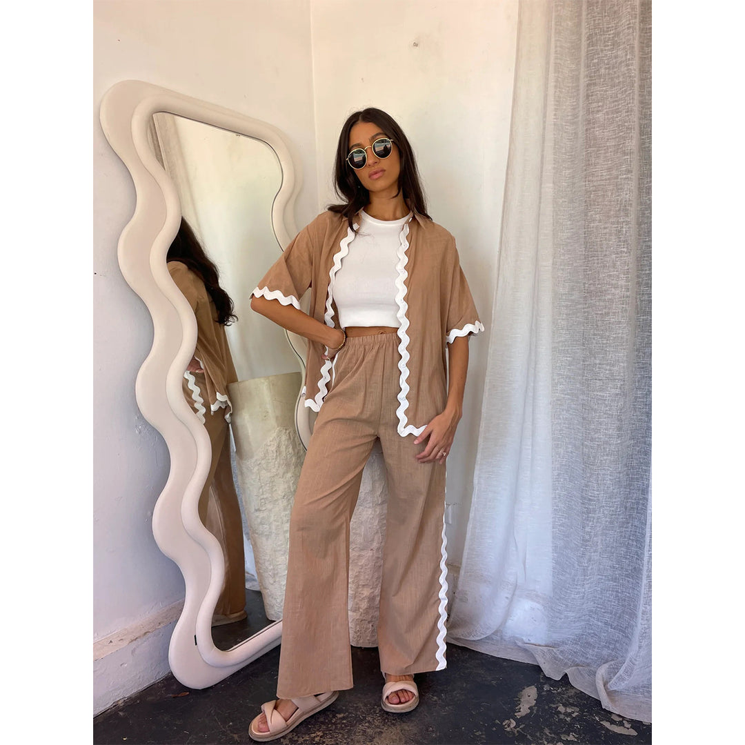 Women's two-piece set with fresh linen fabric and decorative wavy hem