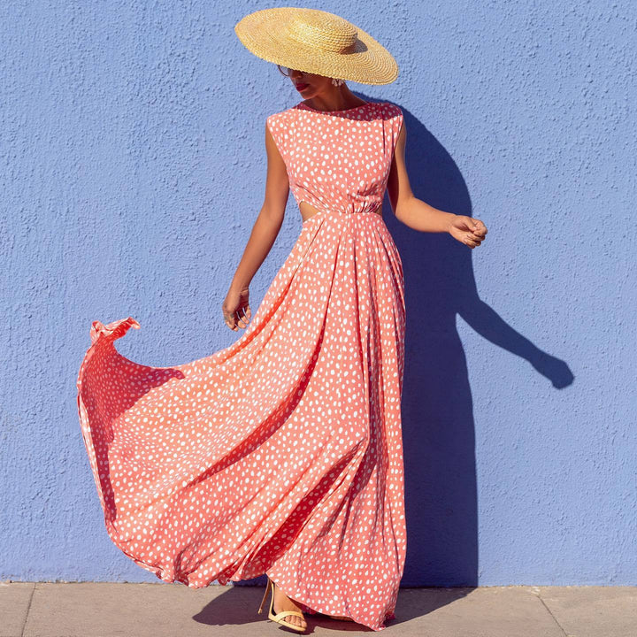 Women's maxi polka dot dress with sophisticated cut and elegant details