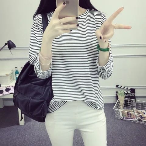 Women's striped long-sleeve shirt with soft textured fabric and casual fit