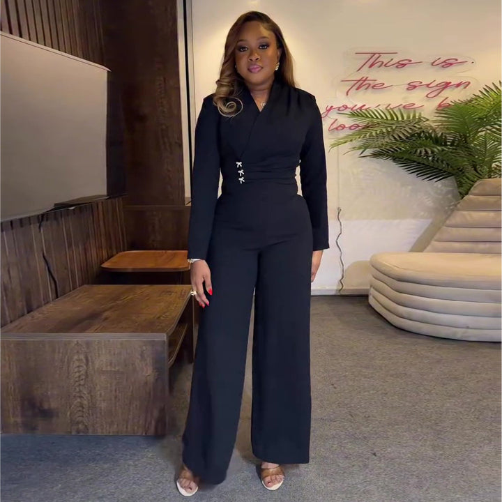Women's jumpsuit with elegant wrap design and details at waist height